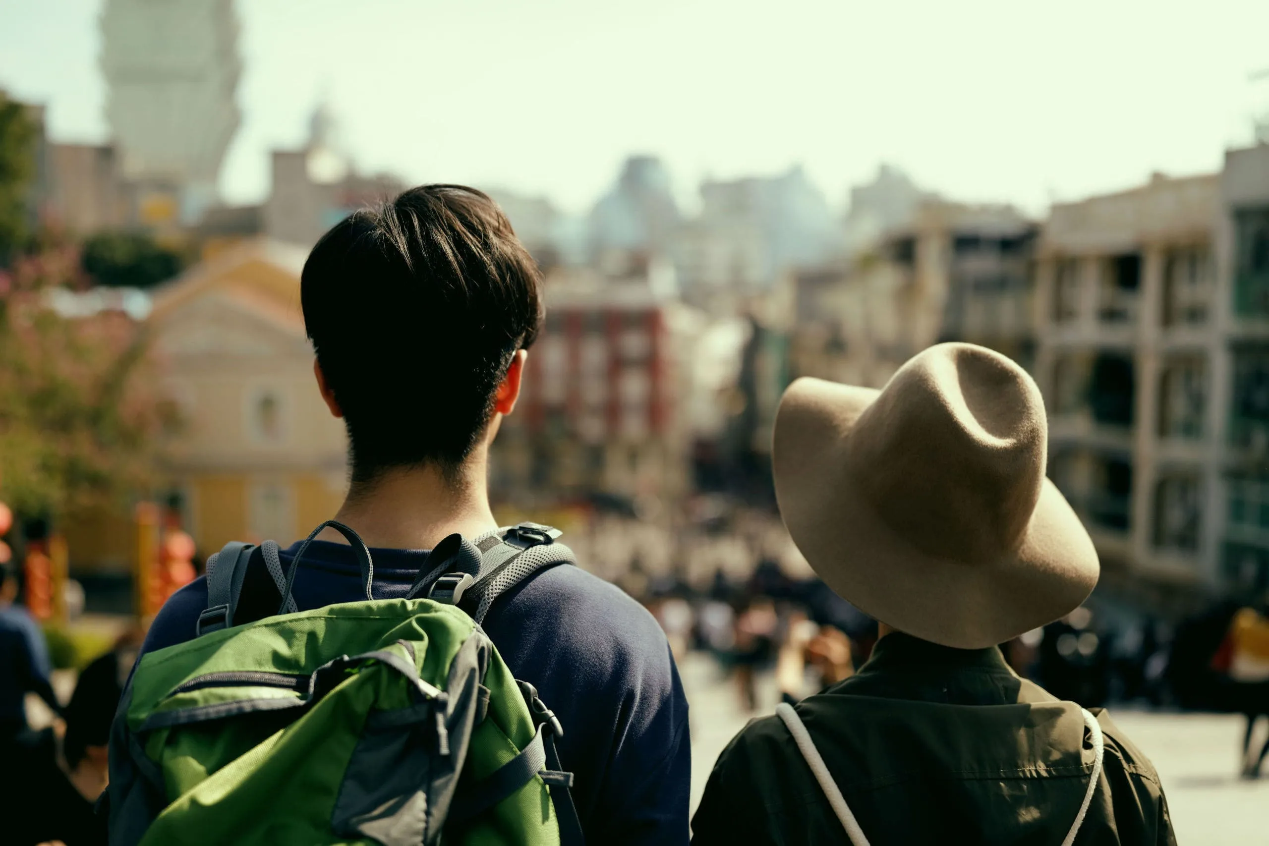 Travellers looking out across Macau's neighbourhood streets